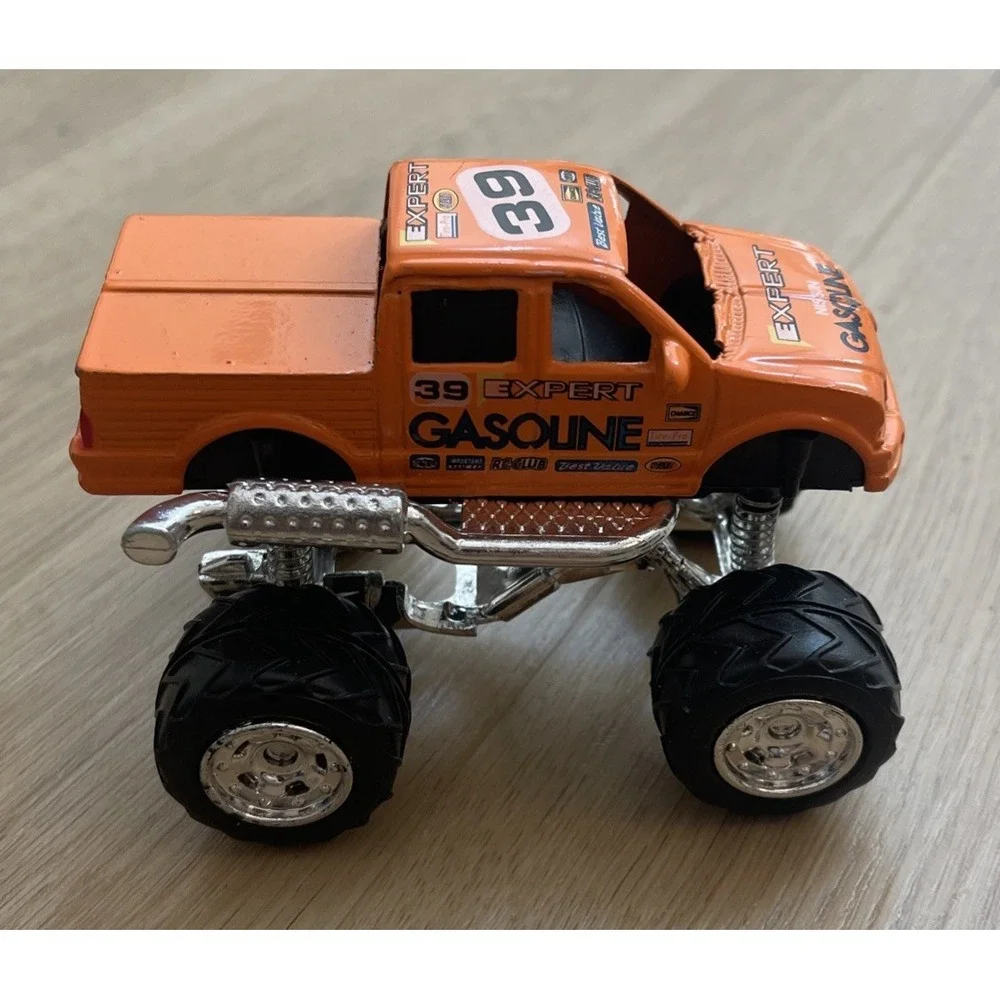 Monster Truck #39 Expert Gasoline Orange 4x4 Diecast Vehicle 1:43 4